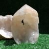 Side view of wholesale cut base natural geode crystal tower specimen
