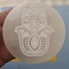 Wholesale round white selenite crystal plate engraved with clean white Hamsa hand design